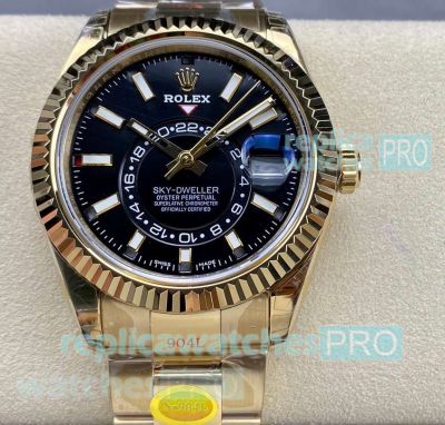 NOOB Factory Replica Rolex Sky-Dweller Black Dial Yellow Gold Fluted Bezel Watch